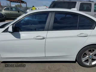 2015 BMW 3 Series 328i with VIN WBA3A5G51FNS89956, listed as a IAAI auction lot 42012575 with 121,246 mi miles. Bid and sale history available at carsss.com. Image 14.