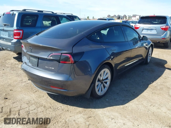 2021 Tesla Model 3 Long Range with VIN 5YJ3E1EB9MF997442, listed as a IAAI auction lot 41759875 with 87,059 mi miles. Bid and sale history available at carsss.com. Image 4.