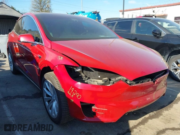 2020 Tesla Model X Long Range with VIN 5YJXCDE22LF217014, listed as a IAAI auction lot 41845824 with 149,375 mi miles and . Bid and sale history available at DreamBid. Image 1.