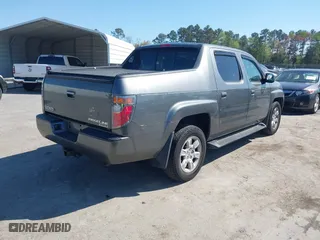 2007 Honda Ridgeline RTL w/Leather with VIN 2HJYK16557H531198, listed as a IAAI auction lot 41998612 with 194,975 mi miles. Bid and sale history available at carsss.com. Image 4.