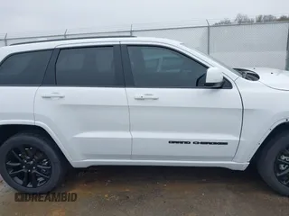 2021 Jeep Grand Cherokee Laredo E with VIN 1C4RJEAG7MC713026, listed as a IAAI auction lot 42010894 with 37,336 mi miles and . Bid and sale history available at DreamBid. Image 14.