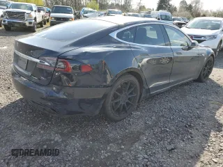 2016 Tesla Model S 90D with VIN 5YJSA1E2XGF150490, listed as a Copart auction lot 51070365 with 144,457 mi miles and Salvage Title. Bid and sale history available at DreamBid. Image 3.