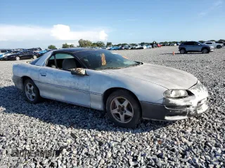 1999 Chevrolet Camaro z VIN 2G1FP22K4X2119705, wystawiony jako Copart lot #61094235 z przebiegiem Nie podano mil oraz Czysty tytuł • Clean title. Historia ofert i sprzedaży dostępna na DreamBid. Obrazek 4.