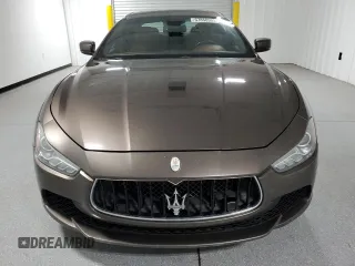 2016 Maserati Ghibli S Q4 z VIN ZAM57RTA4G1168220, wystawiony jako Copart lot #57850955 z przebiegiem 126 378 mil mil oraz Tytuł czysty. Historia ofert i sprzedaży dostępna na DreamBid. Obrazek 5.