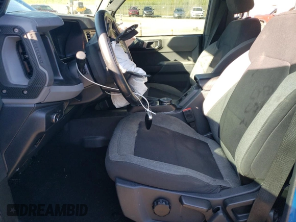 2021 Ford Bronco z VIN 1FMDE5BH2MLA73700, wystawiony jako Copart lot #63024595 z przebiegiem 63 174 mil mil oraz Szkoda całkowita • Salvage title. Historia ofert i sprzedaży dostępna na DreamBid. Obrazek 7.
