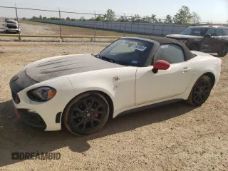 2019 FIAT 124 Spider Urbana Edition z VIN JC1NFAEK6K0142941, wystawiony jako Copart lot #75939004 z przebiegiem 28 402 mil mil oraz Szkoda całkowita • Salvage title. Historia ofert i sprzedaży dostępna na DreamBid. Obrazek 1.