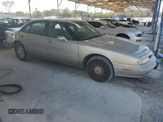 1998 Oldsmobile 88 LS z VIN 1G3HN52K4W4803377, wystawiony jako Copart lot #75638114 z przebiegiem 75 754 mil mil oraz Tytuł czysty. Historia ofert i sprzedaży dostępna na DreamBid. Obrazek 4.