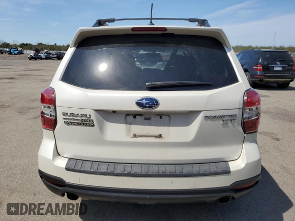 2014 Subaru Forester XT Touring with VIN JF2SJGMC2EH435440, listed as a Copart auction lot 53705975 with 119,615 mi miles and Salvage Title. Bid and sale history available at DreamBid. Image 6.