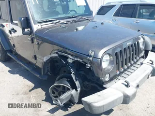 2016 Jeep Wrangler Unlimited Sport z VIN 1C4BJWDG7GL229364, wystawiony jako IAAI lot #42239069 z przebiegiem 87 001 mil mil oraz . Historia ofert i sprzedaży dostępna na DreamBid. Obrazek 6.