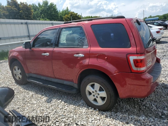 2009 Ford Escape XLS with VIN 1FMCU02739KA51016, listed as a Copart auction lot 63267285 with 152,559 mi miles and Salvage title. Bid and sale history available at DreamBid. Image 2.