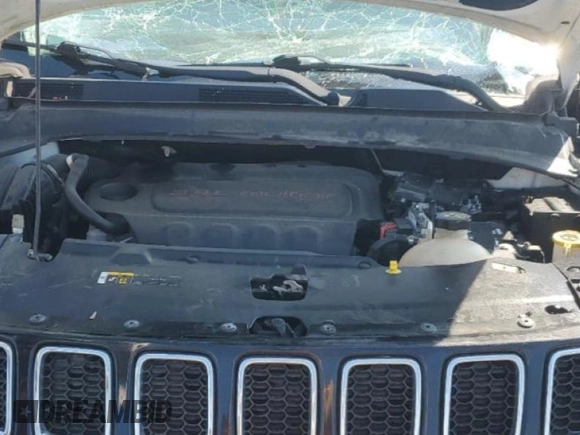 2018 Jeep Compass Latitude z VIN 3C4NJDBB7JT333535, wystawiony jako Copart lot #57238105 z przebiegiem 52 272 mil mil oraz Szkoda całkowita • Salvage title. Historia ofert i sprzedaży dostępna na DreamBid. Obrazek 11.
