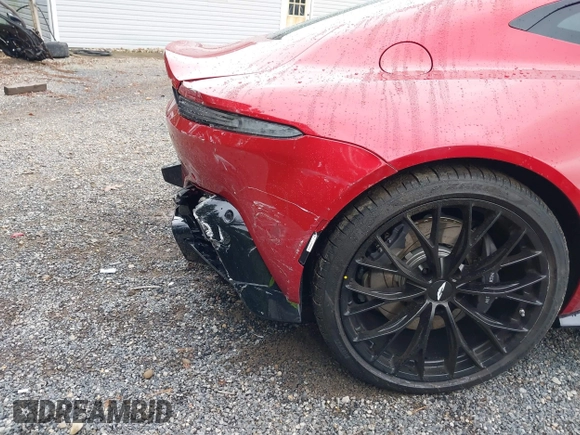 2023 Aston Martin Vantage z VIN SCFSMGAW8PGN08275, wystawiony jako IAAI lot #40460970 z przebiegiem 2 602 mil mil oraz . Historia ofert i sprzedaży dostępna na DreamBid. Obrazek 22.