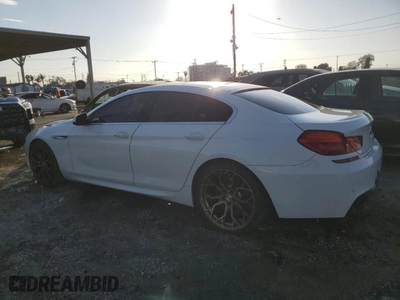 2013 BMW 6 Series 640i with VIN WBA6A0C50DDF14086, listed as a Copart auction lot 42547825 with 236,861 mi miles and Clean Title. Bid and sale history available at DreamBid. Image 2.