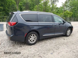 2020 Chrysler Pacifica Touring L with VIN 2C4RC1BG0LR182341, listed as a Copart auction lot 58519235 with 80,212 mi miles and Salvage title. Bid and sale history available at DreamBid. Image 3.