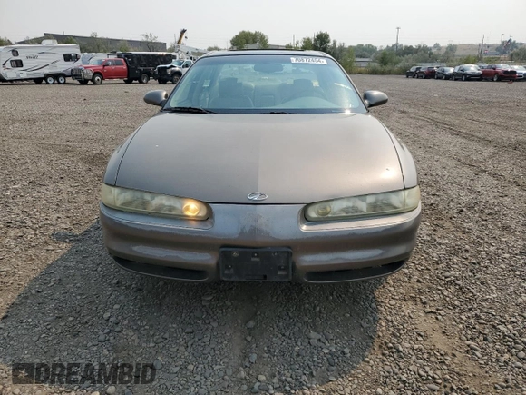 2000 Oldsmobile Intrigue GL z VIN 1G3WS52H4YF210758, wystawiony jako Copart lot #70872454 z przebiegiem 103 298 mil mil oraz Tytuł czysty. Historia ofert i sprzedaży dostępna na DreamBid. Obrazek 5.