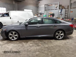 2019 Honda Accord Touring with VIN 1HGCV2F99KA031634, listed as a IAAI auction lot 41209019 with 74,965 mi miles and . Bid and sale history available at DreamBid. Image 14.