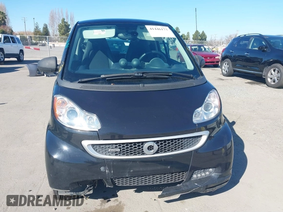 2014 Smart fortwo Pure with VIN WMEEJ3BA0EK740736, listed as a IAAI auction lot 41446173 with 68,530 mi miles and . Bid and sale history available at DreamBid. Image 11.