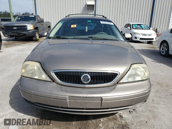 2003 Mercury Sable LS Premium z VIN 1MEFM59S03A606329, wystawiony jako Copart lot #79331624 z przebiegiem 152 059 mil mil oraz Nie do naprawy. Historia ofert i sprzedaży dostępna na DreamBid. Obrazek 5.