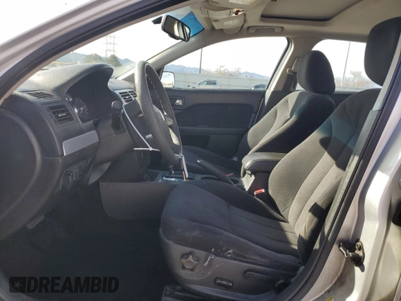 2009 Mercury Milan with VIN 3MEHM07Z29R634238, listed as a Copart auction lot 49627485 with 102,404 mi miles and Salvage title. Bid and sale history available at DreamBid. Image 7.
