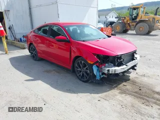 2021 Honda Civic Sport with VIN 2HGFC2F84MH536320, listed as a IAAI auction lot 42145631 with 50,664 mi miles and . Bid and sale history available at DreamBid. Image 1.