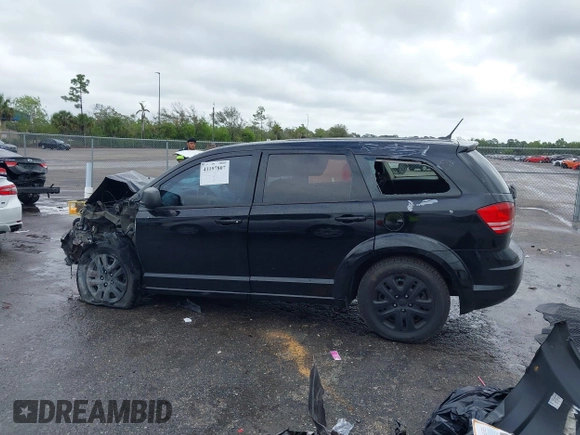 2014 Dodge Journey American Value Pkg with VIN 3C4PDCAB9ET170601, listed as a IAAI auction lot 41197807 with Not Provided miles. Bid and sale history available at carsss.com. Image 13.