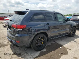 2018 Jeep Grand Cherokee Trackhawk with VIN 1C4RJFN99JC309254, listed as a Copart auction lot 64061615 with 104,558 mi miles and Clean title. Bid and sale history available at DreamBid. Image 3.