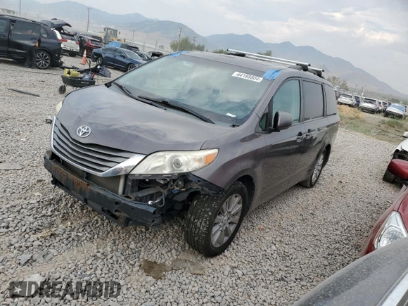 2012 Toyota Sienna XLE with VIN 5TDDK3DC7CS039221, listed as a Copart auction lot 64188804 with 180,811 mi miles and Salvage Title. Bid and sale history available at carsss.com. Image 1.