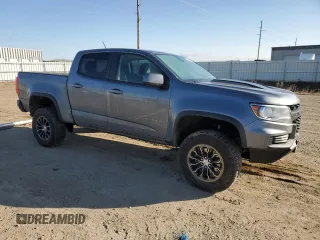 2021 Chevrolet Colorado 4WD ZR2 with VIN 1GCGTEEN6M1221254, listed as a Copart auction lot 51690365 with 49,063 mi miles and Salvage title. Bid and sale history available at DreamBid. Image 4.