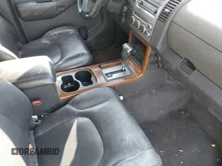 2006 Nissan Pathfinder SE z VIN 5N1AR18W66C674102, wystawiony jako IAAI lot #41984100 z przebiegiem 274 803 mil mil oraz . Historia ofert i sprzedaży dostępna na DreamBid. Obrazek 5.