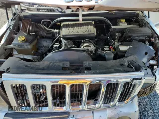 2007 Jeep Commander Sport z VIN 1J8HG48P47C691235, wystawiony jako Copart lot #64057505 z przebiegiem 135 641 mil mil oraz Szkoda całkowita • Salvage title. Historia ofert i sprzedaży dostępna na DreamBid. Obrazek 12.