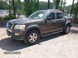 2007 Ford Explorer Sport Trac XLT z VIN 1FMEU31K37UA07311, wystawiony jako IAAI lot #42352365 z przebiegiem 167 282 mil mil oraz . Historia ofert i sprzedaży dostępna na DreamBid. Obrazek 2.