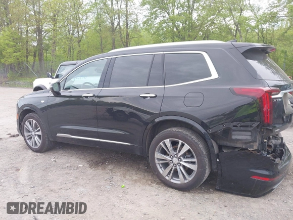 2022 Cadillac XT6 Premium Luxury with VIN 1GYKPDRS5NZ149971, listed as a IAAI auction lot 42259140 with 51,704 mi miles and . Bid and sale history available at DreamBid. Image 14.