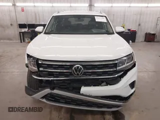 2021 Volkswagen Atlas SE z VIN 1V2HR2CA3MC539997, wystawiony jako IAAI lot #41977786 z przebiegiem 77 372 mil mil oraz . Historia ofert i sprzedaży dostępna na DreamBid. Obrazek 13.