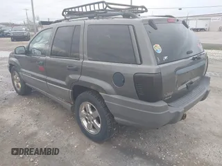 2002 Jeep Grand Cherokee Laredo with VIN 1J4GW48S92C294116, listed as a IAAI auction lot 42080375 with 154,108 mi miles and . Bid and sale history available at DreamBid. Image 3.