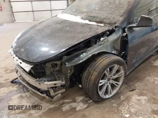 2024 Tesla Model Y Long Range with VIN 7SAYGDEE0RA282634, listed as a IAAI auction lot 41627510 with 23,054 mi miles and . Bid and sale history available at DreamBid. Image 6.