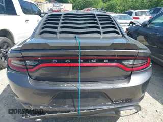2018 Dodge Charger Daytona z VIN 2C3CDXCT4JH261021, wystawiony jako IAAI lot #42188904 z przebiegiem 79 652 mil mil oraz . Historia ofert i sprzedaży dostępna na DreamBid. Obrazek 16.
