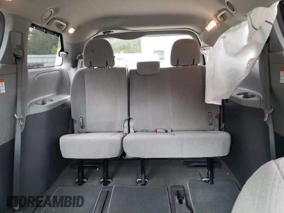 2019 Toyota Sienna LE with VIN 5TDJZ3DC6KS210862, listed as a Copart auction lot 73302064 with 113,768 mi miles and Salvage Title. Bid and sale history available at carsss.com. Image 10.