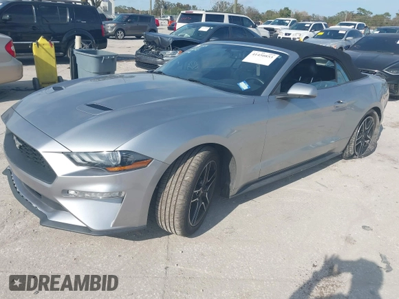 2020 Ford Mustang EcoBoost with VIN 1FATP8UH3L5120704, listed as a IAAI auction lot 41450853 with 88,351 mi miles and . Bid and sale history available at DreamBid. Image 2.