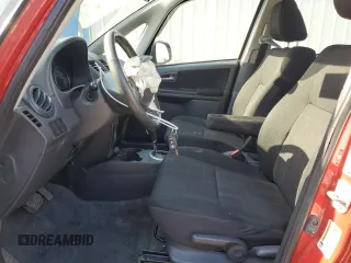 2012 Suzuki SX4 LE z VIN JS2YC5A34C6300969, wystawiony jako Copart lot #49036095 z przebiegiem 163 367 mil mil oraz Szkoda całkowita • Salvage title. Historia ofert i sprzedaży dostępna na DreamBid. Obrazek 7.