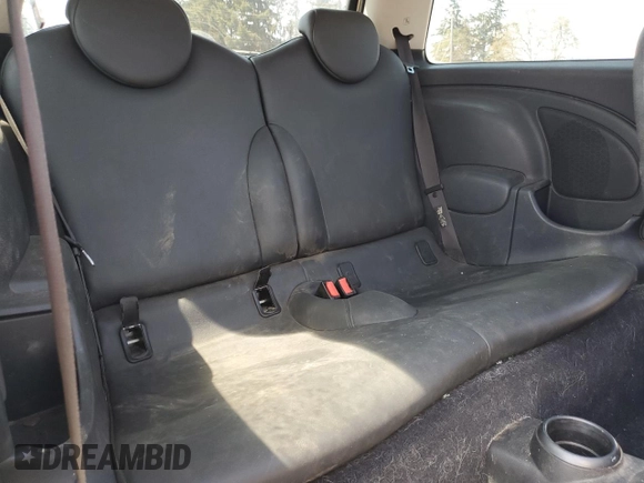 2006 MINI Hardtop with VIN WMWRC33586TJ77908, listed as a Copart auction lot 55095525 with 143,810 mi miles and Salvage title. Bid and sale history available at DreamBid. Image 10.