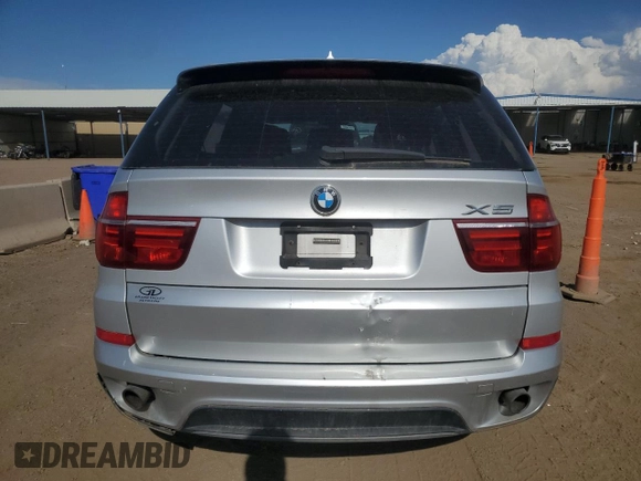 2011 BMW X5 35i z VIN 5UXZV4C55BL739114, wystawiony jako Copart lot #58393605 z przebiegiem 161 015 mil mil oraz Czysty tytuł • Clean title. Historia ofert i sprzedaży dostępna na DreamBid. Obrazek 6.