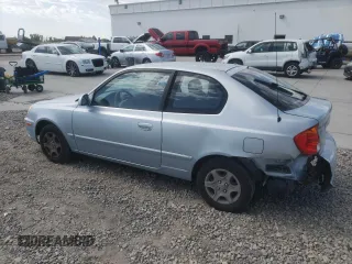 2005 Hyundai Accent GLS with VIN KMHCG35C55U341192, listed as a Copart auction lot 70708994 with 174,872 mi miles and Salvage Title. Bid and sale history available at carsss.com. Image 2.