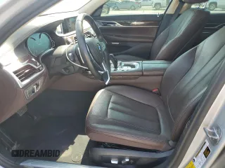 2018 BMW 7 Series 740e xDrive iPerformance with VIN WBA7J2C51JG938447, listed as a Copart auction lot 63021064 with 81,105 mi miles and Salvage Title. Bid and sale history available at carsss.com. Image 7.