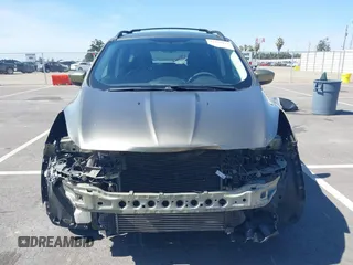 2013 Ford Escape SE with VIN 1FMCU0G99DUC05901, listed as a IAAI auction lot 42194672 with 121,435 mi miles and . Bid and sale history available at DreamBid. Image 13.