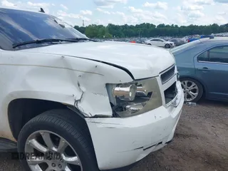 2007 Chevrolet Tahoe LS z VIN 1GNFC13J57R313666, wystawiony jako IAAI lot #42511253 z przebiegiem 374 689 mil mil oraz . Historia ofert i sprzedaży dostępna na DreamBid. Obrazek 6.