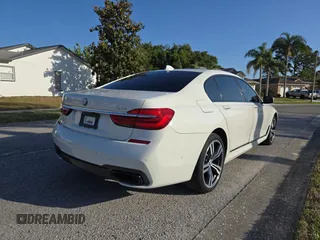 2017 BMW 7 Series 740i with VIN WBA7E2C54HG740427, listed as a Copart auction lot 54992345 with 93,252 mi miles and Clean Title. Bid and sale history available at carsss.com. Image 4.