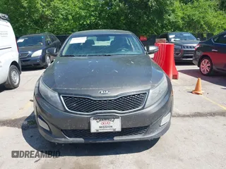 2015 Kia Optima LX z VIN 5XXGM4A77FG356930, wystawiony jako IAAI lot #42261299 z przebiegiem 248 635 mil mil oraz . Historia ofert i sprzedaży dostępna na DreamBid. Obrazek 6.
