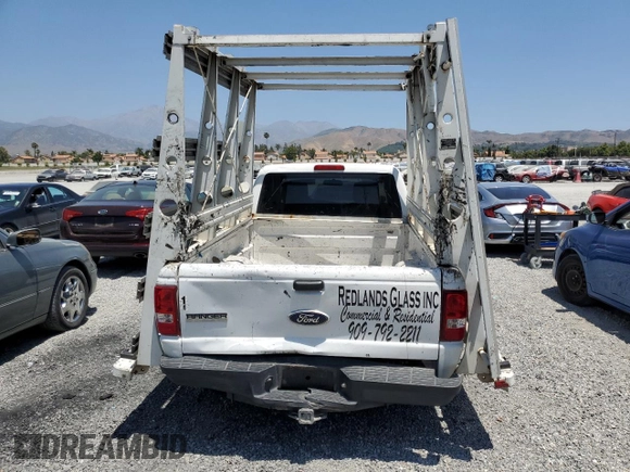 2011 Ford Ranger XL with VIN 1FTKR1EEXBPA10991, listed as a Copart auction lot 58537064 with 102,897 mi miles and Salvage Title. Bid and sale history available at carsss.com. Image 6.