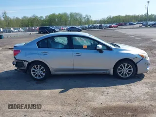 2013 Subaru Impreza Premium z VIN JF1GJAC64DH026776, wystawiony jako IAAI lot #42205812 z przebiegiem 135 887 mil mil oraz . Historia ofert i sprzedaży dostępna na DreamBid. Obrazek 13.