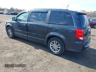 2013 Dodge Grand Caravan SXT with VIN 2C4RDGCG2DR652708, listed as a IAAI auction lot 42043026 with 245,442 mi miles and . Bid and sale history available at DreamBid. Image 3.